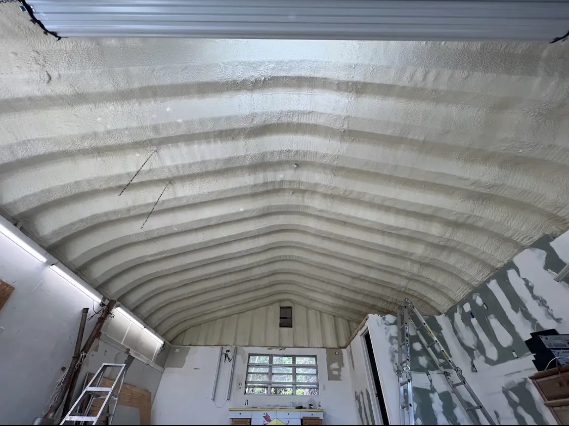 Spray polyurethane foam applied to the underside of a metal roof deck in Lakeland Highlands